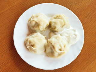 above view of manti dumpling on white plate