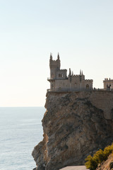 Aurora cliff with Swallow's Nest castle at sunrise