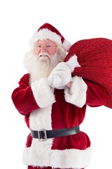 Santa carries his red bag and smiles