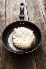 Freshly baked bread in vintage cast iron skillet
