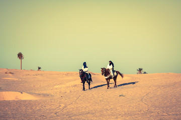 Local people on horses, in the famous Saraha desert,Douz,Tunisia