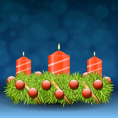 Advent wreath of twigs with red candles and various ornaments