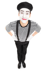 Vertical shot of a joyful mime artist