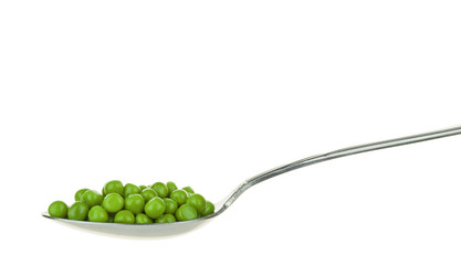 A spoonful of fresh green peas on a white background