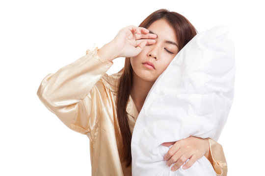 Asian girl  wake up  sleepy and drowsy with pillow