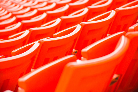 stadium, red seats on stadium steps bleacher