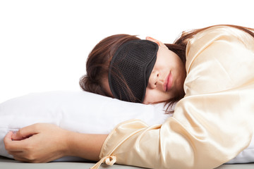 Obraz na płótnie Canvas Sleeping Asian girl with eye mask