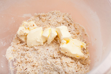 Closeup of butter in mixing bowl