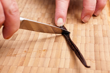 Scratch out vanilla pulp from pod with a knife