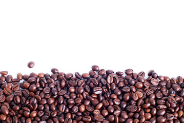 coffee beans from the bottom on a white isolated background
