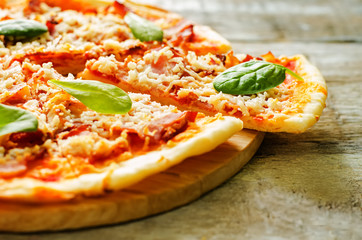 pizza with bacon, mozzarella and spinach © nata_vkusidey
