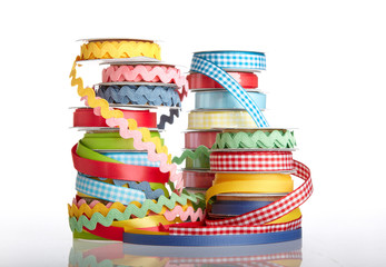 colorful ribbon rolls on white