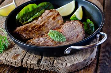 Baked meat with herbs