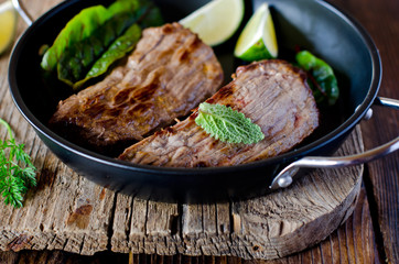 Baked meat with herbs