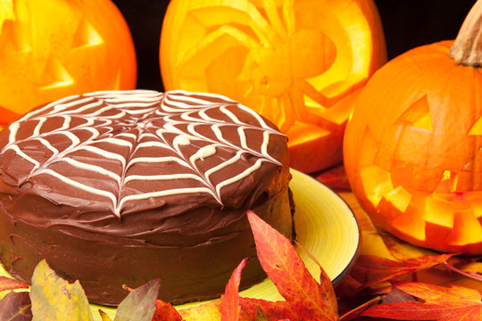 spiders web chocolate cake and pumpkins