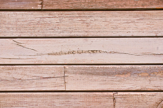 Wooden surface made with brown desks texture. 