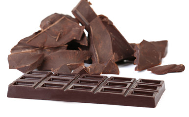 Cracked chocolate bar isolated on white