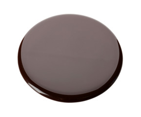 Chocolate syrup drips isolated on white