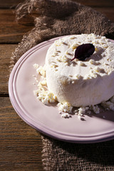 Cottage cheese and leaf of basil