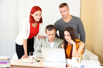 Group of people having meeting in office