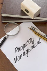 Property management writen on paper - 72385397