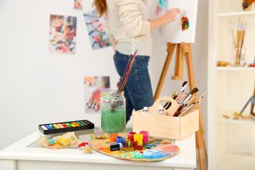 Artist painter on canvas in art studio