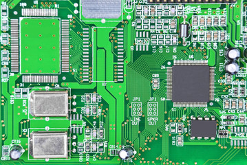 Close up of a printed green computer circuit board