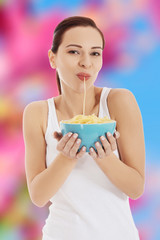 Woman eating pasta