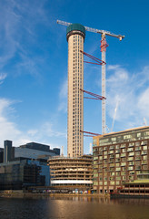 Fototapeta na wymiar Building site with crane, London