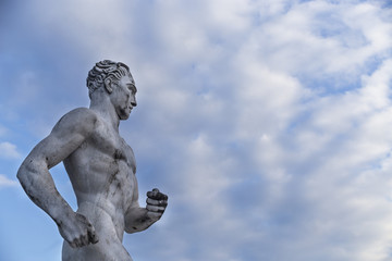 Fototapeta na wymiar Statue of a runner