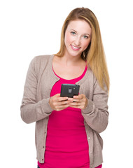 Caucasian woman send message on mobile phone