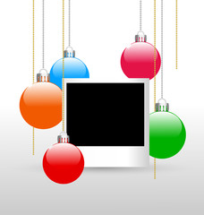 Blank photoframe with christmas multicolored balls on grayscale