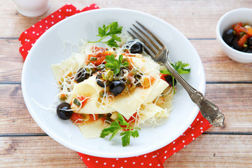 light lasagna with tomato and olives
