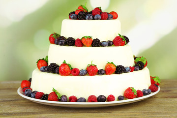 Beautiful wedding cake with berries © Africa Studio