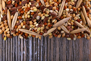 Groats mixture on wooden background