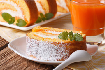 Slice of pumpkin pie on a plate and juice