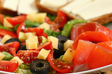 Vegetables salad in a plate fish