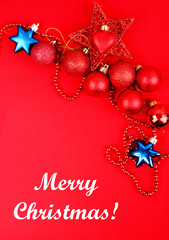 Fototapeta na wymiar Christmas decorations on red background