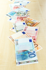 Euro banknotes on table close-up