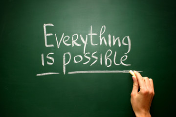 words "Everything is possible" written on blackboard