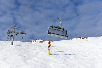 Fototapeta na wymiar Ski lift chairs
