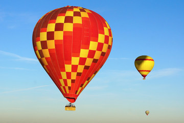 Hot air balloon flying over Cappadocia.