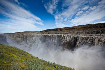 Dettifoss Waterfall in Iceland under a blue sky