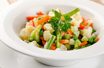 Mixed vegetables in a white  bowl