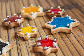 Christmas Cookies stars on wooden table