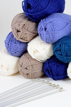 Balls of wool and knitting needles © Arena Photo UK