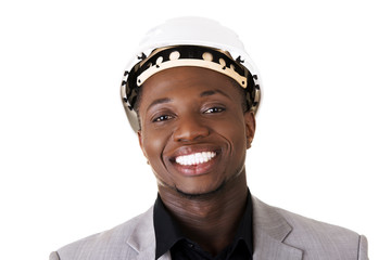 Black businessman wearing helmet