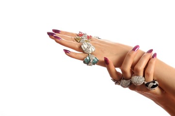 Beautiful woman hands with gemstone rings