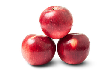 Fototapeta na wymiar Three shiny red autumn apples