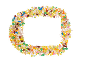 Heap of pills on white background